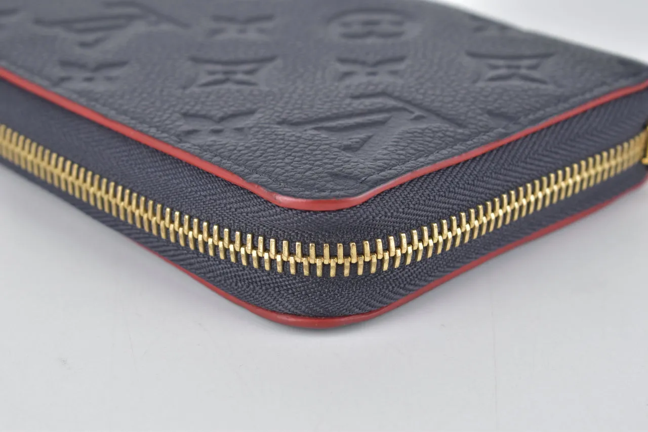 M62121 Marine Rouge Monogram Empreinte Zippy Wallet