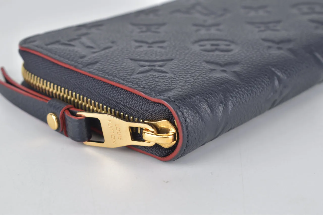 M62121 Marine Rouge Monogram Empreinte Zippy Wallet