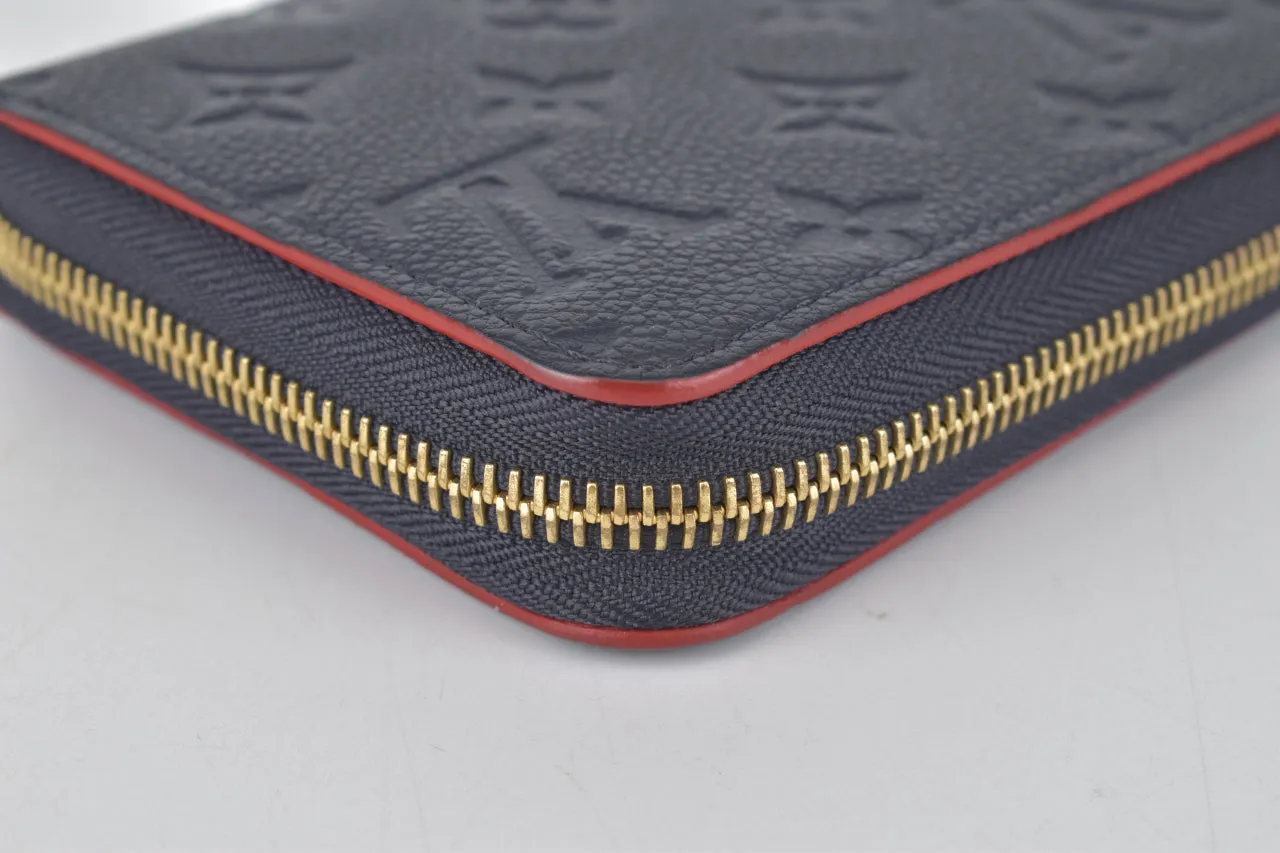 M62121 Marine Rouge Monogram Empreinte Zippy Wallet